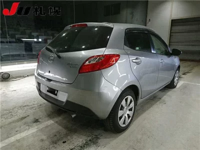Mazda DEMIO  с аукциона в Японии
