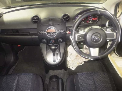 Mazda DEMIO  с аукциона в Японии