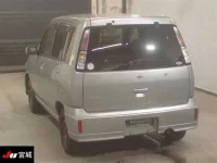 Nissan CUBE лот № 4074 оценка 3.5  с аукциона в Японии 1