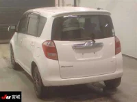 Toyota RACTIS лот № 4100 оценка R  с аукциона в Японии 1