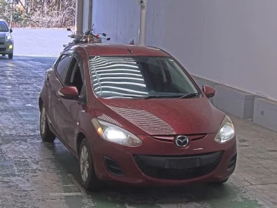 Mazda DEMIO  с аукциона в Японии