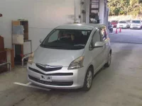 Toyota RACTIS лот № 1086 оценка R  с аукциона в Японии 3