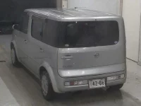 Nissan CUBECUBIC лот № 5607 оценка 3.5  с аукциона в Японии 1