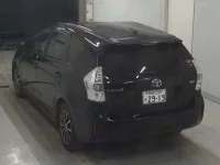 Toyota PRIUS ALPHA лот № 3093 оценка 3.5  с аукциона в Японии 1