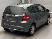 Honda FIT лот № 18037 оценка 3.5  с аукциона в Японии 1