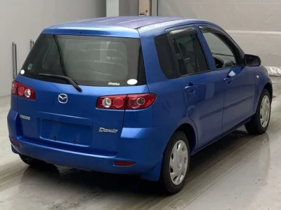 Mazda DEMIO  с аукциона в Японии