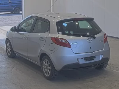 Mazda DEMIO  с аукциона в Японии