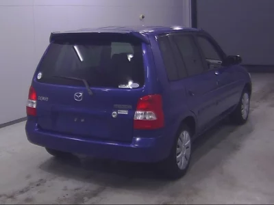 Mazda DEMIO  с аукциона в Японии