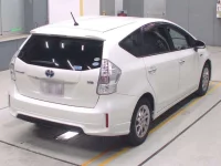 Toyota PRIUS ALPHA лот № 70093 оценка 3.5  с аукциона в Японии 1