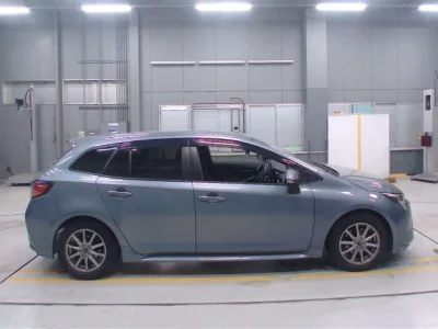 Toyota COROLLA TOURING  с аукциона в Японии