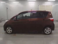 Toyota RACTIS лот № 30858 оценка 4  с аукциона в Японии 3