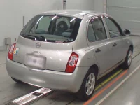 Nissan MARCH лот № 50156 оценка RA  с аукциона в Японии 1