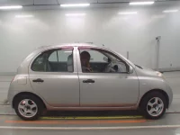 Nissan MARCH лот № 50156 оценка RA  с аукциона в Японии 2