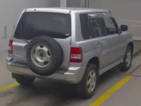 Mitsubishi PAJERO IO лот № 213 оценка 3.5  с аукциона в Японии 1