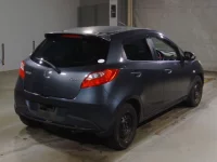 Mazda DEMIO лот № 7128 оценка RA  с аукциона в Японии 1