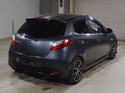 Mazda DEMIO  с аукциона в Японии