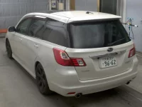 Subaru EXIGA лот № 2118 оценка 3.5  с аукциона в Японии 1