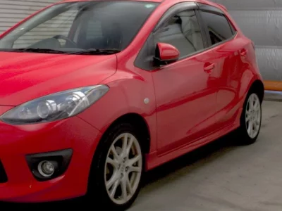 Mazda DEMIO  с аукциона в Японии