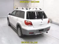 Mitsubishi AIRTREK лот № 60108 оценка 3.5  с аукциона в Японии 1