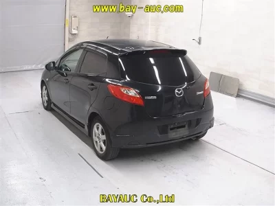 Mazda DEMIO  с аукциона в Японии