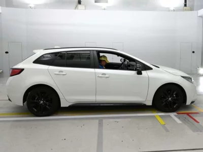 Toyota COROLLA TOURING  с аукциона в Японии