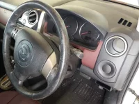 Mazda VERISA лот № 10162 оценка 4  с аукциона в Японии 8