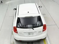 Mazda VERISA лот № 90532 оценка 3.5  с аукциона в Японии 7