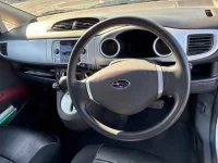 Subaru R1 лот № 90010 оценка 4  с аукциона в Японии 1