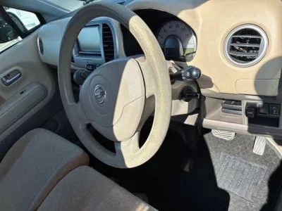 Nissan MOCO  с аукциона в Японии