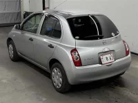 Nissan MARCH лот № 90162 оценка 3.5  с аукциона в Японии 1