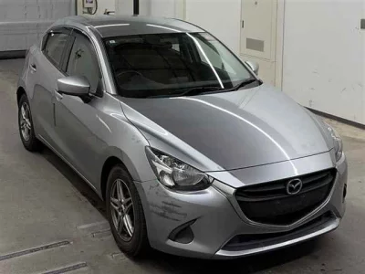 Mazda DEMIO  с аукциона в Японии