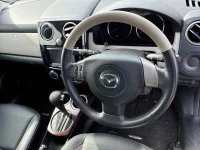 Mazda VERISA лот № 92001 оценка 3.5  с аукциона в Японии 2