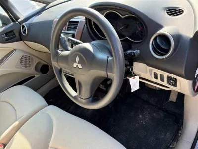 Mitsubishi COLT PLUS  с аукциона в Японии