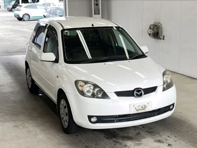 Mazda DEMIO  с аукциона в Японии