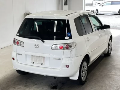 Mazda DEMIO  с аукциона в Японии