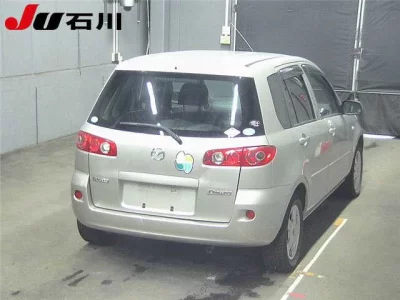 Mazda DEMIO  с аукциона в Японии