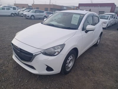 Mazda DEMIO  с аукциона в Японии