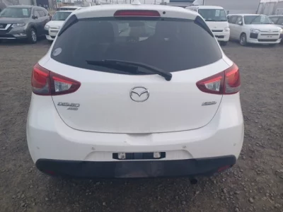 Mazda DEMIO  с аукциона в Японии