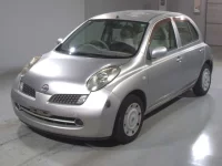 Nissan MARCH лот № 5824 оценка RA  с аукциона в Японии 1