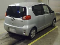 Toyota PORTE лот № 7063 оценка RA  с аукциона в Японии 1