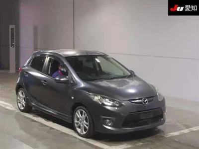 Mazda DEMIO  с аукциона в Японии