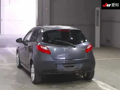 Mazda DEMIO  с аукциона в Японии