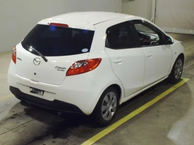 Mazda DEMIO  с аукциона в Японии