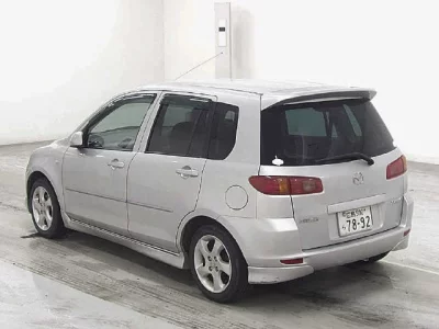 Mazda DEMIO  с аукциона в Японии