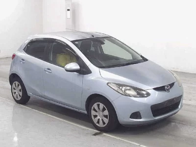 Mazda DEMIO  с аукциона в Японии