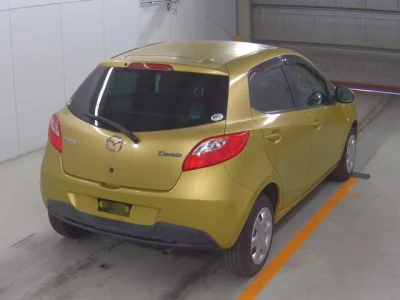 Mazda DEMIO  с аукциона в Японии