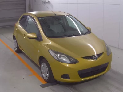 Mazda DEMIO  с аукциона в Японии