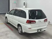 Nissan LIBERTY лот № 90235 оценка 4  с аукциона в Японии 1