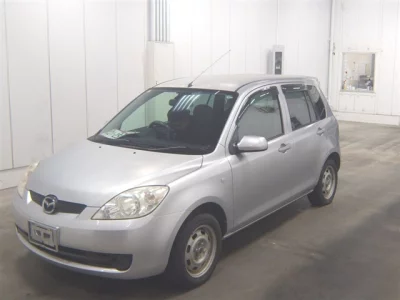 Mazda DEMIO  с аукциона в Японии