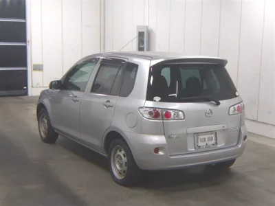 Mazda DEMIO  с аукциона в Японии